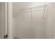 A closet with a wire rack for storage, offering convenient organization in the home at 8991 Fluffy Lie Ct, Davenport, FL 33896