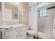 Comfortable bathroom with white vanity, marble countertop, and shower with tub combination at 907 Ridge Spring Ct, Apopka, FL 32712