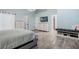 Spacious main bedroom with a decorative ceiling fixture, ensuite bathroom and built-in shoe storage at 907 Ridge Spring Ct, Apopka, FL 32712