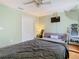 Bedroom with a bed, closet, and television at 9076 Lake Avon Dr, Orlando, FL 32829