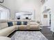 Open concept living area with bright light and view to kitchen at 9076 Lake Avon Dr, Orlando, FL 32829