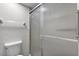 Bathroom with shower, tile floor, and white toilet at 11 Escondido Cir # 110, Altamonte Springs, FL 32701
