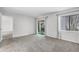 Spacious bedroom with neutral carpet, natural light, and access to patio at 11 Escondido Cir # 110, Altamonte Springs, FL 32701
