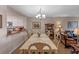 Dining room with an elegant chandelier and decorative furnishings at 11 Escondido Cir # 110, Altamonte Springs, FL 32701