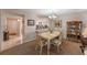 Dining area with elegant decor and view into the kitchen at 11 Escondido Cir # 110, Altamonte Springs, FL 32701