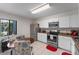 Bright kitchen with stainless steel appliances and a cozy eat-in area at 11 Escondido Cir # 110, Altamonte Springs, FL 32701