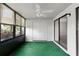 Sunroom with a ceiling fan, natural light and views of the backyard at 11 Escondido Cir # 110, Altamonte Springs, FL 32701