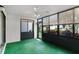 Bright sunroom with large windows with views of the landscaped backyard at 11 Escondido Cir # 110, Altamonte Springs, FL 32701