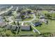 An aerial view of a home showcasing the layout of the property and the surrounding neighborhood at 116 Alcala Dr, Kissimmee, FL 34758