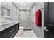 The bathroom suite has a modern shower and vanity with stylish tiling at 116 Alcala Dr, Kissimmee, FL 34758