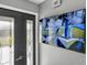 Front door with home security monitoring system showing multiple exterior camera angles around the property at 116 Alcala Dr, Kissimmee, FL 34758
