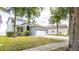 Beautiful two-story home showcasing well-manicured lawn and a spacious driveway at 1204 Blackheath Ct, Davenport, FL 33897