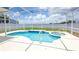 Screened-in pool and spa with sunny deck, perfect for outdoor relaxation at 1204 Blackheath Ct, Davenport, FL 33897