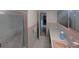 Bathroom with tiled walls, shower, and vanity; a functional and clean space at 1221 Oak Haven Dr, Altamonte Springs, FL 32714