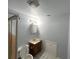 Bathroom with a toilet, sink, shower, and light fixture above the vanity at 1221 Oak Haven Dr, Altamonte Springs, FL 32714