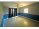 Bright bedroom featuring neutral paint, terrazzo flooring, and a ceiling fan with light at 1221 Oak Haven Dr, Altamonte Springs, FL 32714