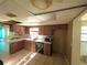 Functional kitchen with wood cabinets, stainless steel sink, and ample counter space for meal preparation at 1221 Oak Haven Dr, Altamonte Springs, FL 32714