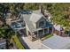An aerial view of the home showcasing the well-manicured landscaping, outdoor kitchen, and charming curb appeal at 13 Hill Ave, Orlando, FL 32801