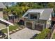 Aerial view of a two-car garage featuring a private backyard with a fire pit at 13 Hill Ave, Orlando, FL 32801