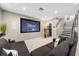 A comfortable theater room features a large screen and a plush sectional sofa at 13 Hill Ave, Orlando, FL 32801