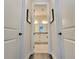 Elegant bathroom showcasing white cabinetry and modern fixtures at 15707 Cutter Sail Pl, Winter Garden, FL 34787