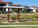 Convenient dog wash station with water access near grassy area and community houses at 15707 Cutter Sail Pl, Winter Garden, FL 34787