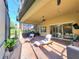 Charming lanai with a view of the lush backyard and comfortable lounge chairs at 15707 Cutter Sail Pl, Winter Garden, FL 34787