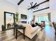 Elegant living area with high ceilings, fireplace, and open floor plan at 15707 Cutter Sail Pl, Winter Garden, FL 34787