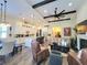Open-concept floorplan showing the kitchen, living room, and dining areas at 15707 Cutter Sail Pl, Winter Garden, FL 34787