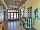 The decorated lobby with modern lighting creates a welcoming entrance at 15707 Cutter Sail Pl, Winter Garden, FL 34787
