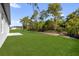Backyard showcasing an expansive lawn, perfect for outdoor activities at 15823 Sw 27Th Avenue Rd, Ocala, FL 34473