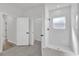 Modern bathroom with walk-in shower featuring white tile and glass door at 15823 Sw 27Th Avenue Rd, Ocala, FL 34473