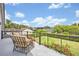 Relaxing balcony area with outdoor seating and lush garden views at 1661 Woodland Ave, Winter Park, FL 32789