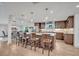 Modern kitchen featuring a large center island with barstool seating at 1661 Woodland Ave, Winter Park, FL 32789