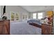 Serene main bedroom featuring outdoor access and comfortable seating at 1661 Woodland Ave, Winter Park, FL 32789