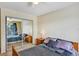 Bedroom with a ceiling fan, carpeted floors, and sliding closet doors at 1728 Townhall Ln # 1728, Orlando, FL 32807