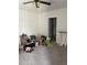Spacious bedroom with a carpeted floor and a doorway leading to an en-suite bathroom at 17333 Cagan Crossings Blvd, Clermont, FL 34714