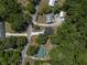 Aerial view of the home nestled among trees, showcasing its private setting at 1819 Carr St, Deland, FL 32720