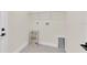 Functional laundry room complete with hookups and storage shelving at 1819 Carr St, Deland, FL 32720