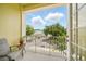 Cozy balcony view overlooking landscaped community with seating at 1845 Common Way Rd # 28-206, Orlando, FL 32814