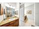 Bathroom featuring granite countertop and shower/tub combo at 1845 Common Way Rd # 28-206, Orlando, FL 32814