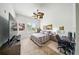Bedroom with ceiling fan, neutral carpet, and modern decor at 1845 Common Way Rd # 28-206, Orlando, FL 32814