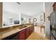 Kitchen seamlessly blends into the open-plan living space, perfect for entertaining at 1845 Common Way Rd # 28-206, Orlando, FL 32814