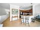 Kitchen featuring a breakfast bar with seating and modern appliances at 1845 Common Way Rd # 28-206, Orlando, FL 32814
