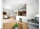 Bright and airy living room with breakfast bar and kitchen featuring modern accents at 1845 Common Way Rd # 28-206, Orlando, FL 32814