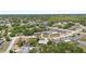 Scenic aerial view of the property in a neighborhood with mature trees and landscaping at 1889 Eden Dr, Deltona, FL 32725