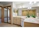 Bathroom featuring double vanity, ample counter space, and a walk-in shower at 1889 Eden Dr, Deltona, FL 32725