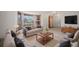 Comfortable living room with bay window, plush sofas, and modern furnishings at 1889 Eden Dr, Deltona, FL 32725