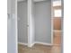 A glimpse into the bathroom with a toilet and tile shower at 2901 N Halifax Ave # 220, Daytona Beach, FL 32118