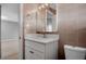 Bathroom features neutral tile, single sink vanity with white doors, and a medicine cabinet at 2901 N Halifax Ave # 220, Daytona Beach, FL 32118